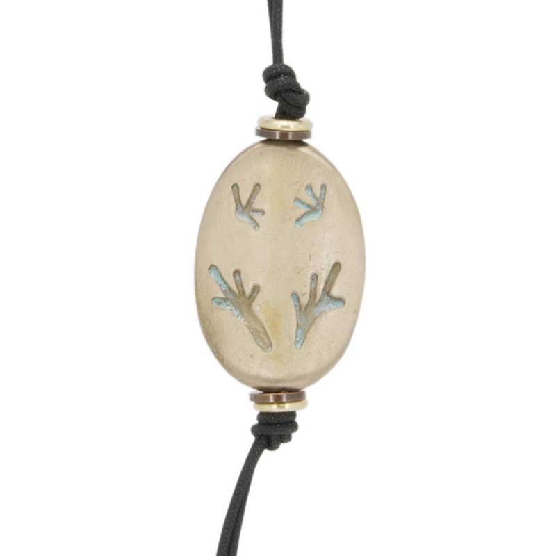 Tree Frog Amulet Zipper Pull : The amulet features a tree frog poised on a branch.