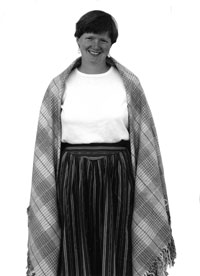 Shawl folded to triangle on shoulders